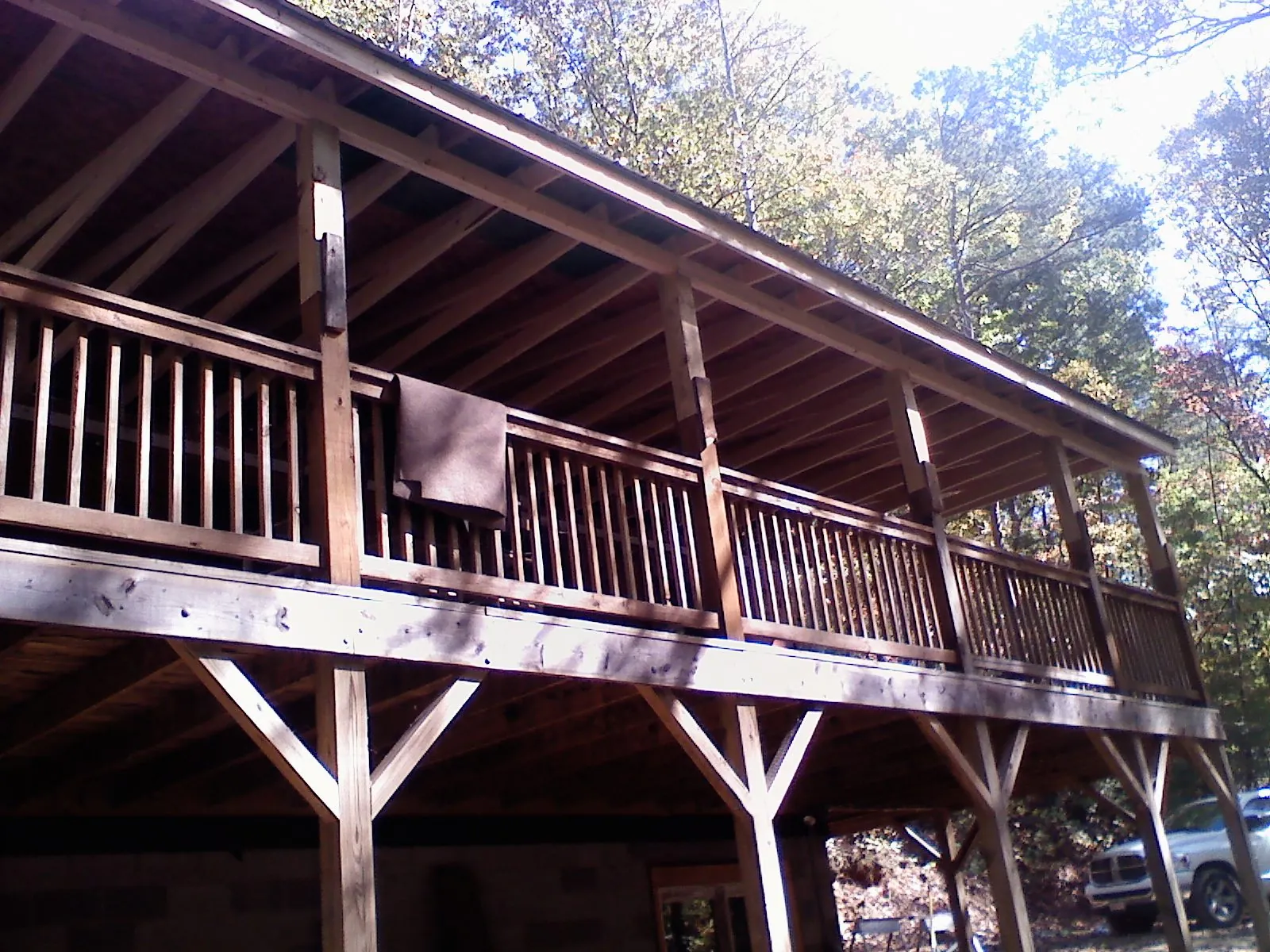 Timber framing under a new elevated porch and deck — Roof Leak Repair in Eastford by Roofing Brothers